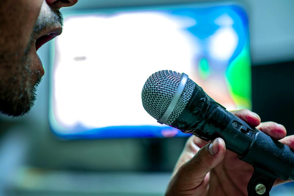 Person speaking confidently on stage